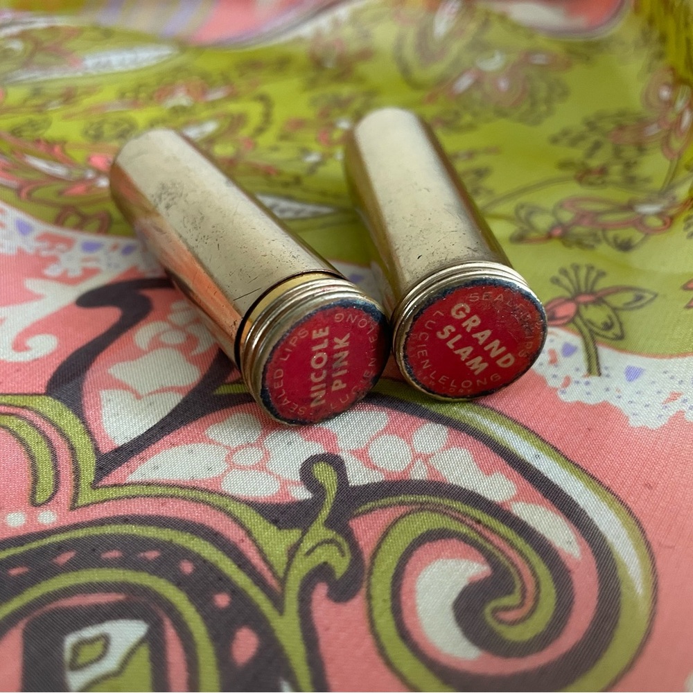 2 vintage ‘40s Lucien Lelong lipstick brass bullet case, Nicole Pink, Grand Slam